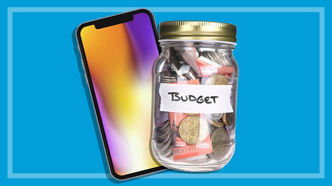 smartphone and a jar of money labelled budget